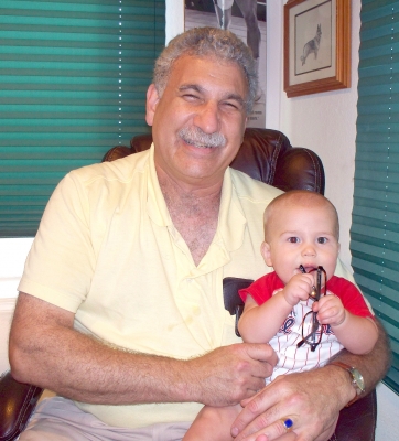 Dr Grossman hold Smitty at 6 months old roanoke island animal clinic Dr Grossman hold Smitty at 6 months old roanoke island animal clinic